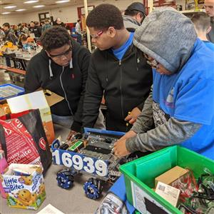 students working on robotic programs